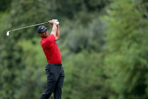 AUGUSTA, GEORGIA - APRIL 14: Tiger Woods of the United States plays his second shot on the par 4, fifth hole during the final round of the 2019 Masters Tournament at Augusta National Golf Club on April 14, 2019 in Augusta, Georgia. (Photo by David Cannon/Getty Images)
