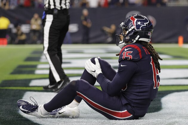 HOUSTON, TX - OCTOBER 25:  Will Fuller #15 of the Houston Texans holds his knee in the end zone during the fourth quarter against the Miami Dolphins at NRG Stadium on October 25, 2018 in Houston, Texas.  (Photo by Tim Warner/Getty Images)