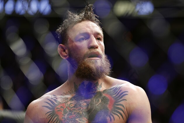 Conor McGregor reacts after losing to Khabib Nurmagomedov in a lightweight title mixed martial arts bout at UFC 229 in Las Vegas, Saturday, Oct. 6, 2018. Nurmagomedov won the fight by submission during the fourth round to retain the title. (AP Photo/John Locher)