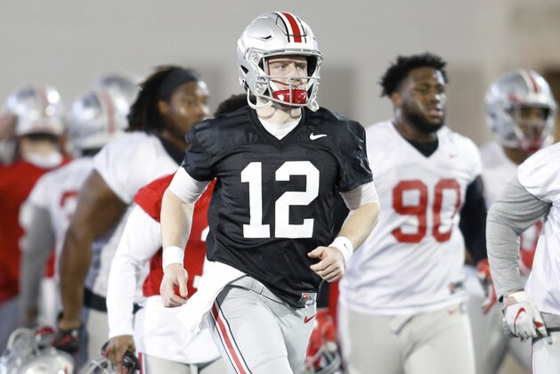 Ohio State University quarterback Matthew Baldwin runs through a drill during an NCAA college football practice in Columbus, Ohio, Wednesday, March 6, 2019. (AP Photo/Paul Vernon)