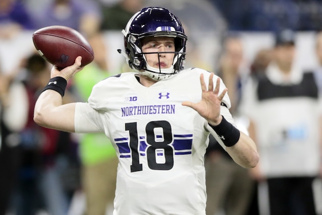 Northwestern quarterback Clayton Thorson (18) throws during the first half of the Big Ten championship NCAA college football game against Ohio State, Saturday, Dec. 1, 2018, in Indianapolis. (AP Photo/AJ Mast)