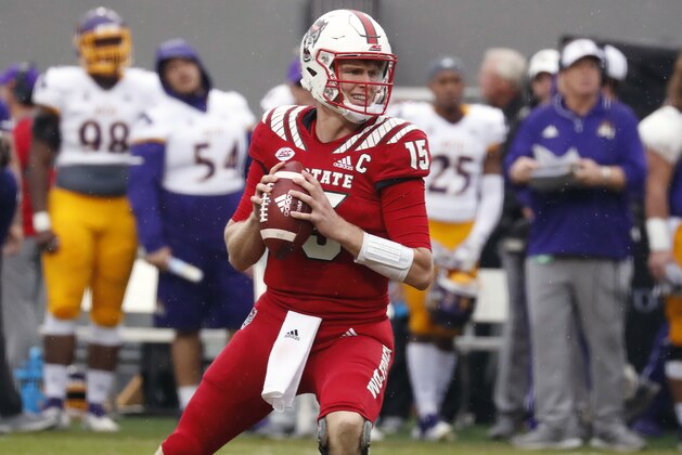 North Carolina State's Ryan Finley (15) looks to pass against East Carolina during the second half of NCAA college football game in Raleigh, N.C., Saturday, Dec. 1, 2018. N.C. (AP Photo/Chris Seward)
