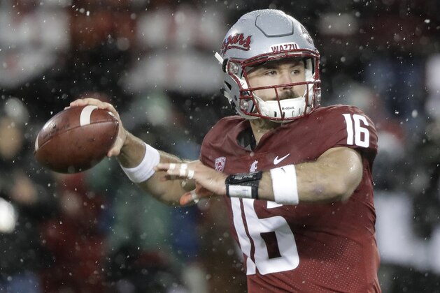 FILE - In this Nov. 23, 2018, file photo, Washington State quarterback Gardner Minshew passes against Washington during the first half of an NCAA college football game in Pullman, Wash. Minshew was named the Pac-12 offensive player of the year and the newcomer of the year Thursday, Dec. 6, 2018. (AP Photo/Ted S. Warren, File)