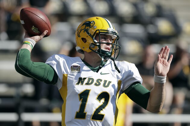 North Dakota State quarterback Easton Stick warms up before an NCAA college football game against Iowa, Saturday, Sept. 17, 2016, in Iowa City, Iowa. (AP Photo/Charlie Neibergall)