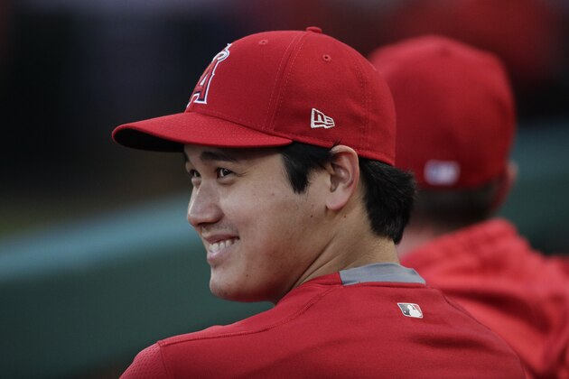 Los Angeles Angels' Shohei Ohtani, of Japan, smiles in the dugout before the team's baseball game against the Milwaukee Brewers, Wednesday, April 10, 2019, in Anaheim, Calif. (AP Photo/Jae C. Hong)
