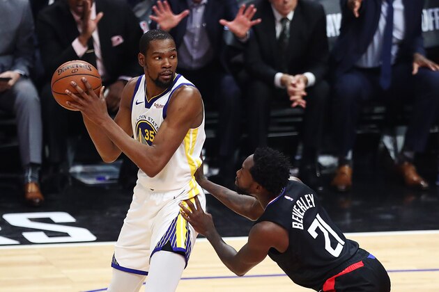 LOS ANGELES, CALIFORNIA - APRIL 18: Kevin Durant #35 of the Golden State Warriors posts up against Patrick Beverley #21 of the Los Angeles Clippers during the first half at Staples Center on April 18, 2019 in Los Angeles, California. NOTE TO USER: User expressly acknowledges and agrees that, by downloading and or using this photograph, User is consenting to the terms and conditions of the Getty Images License Agreement. (Photo by Yong Teck Lim/Getty Images)