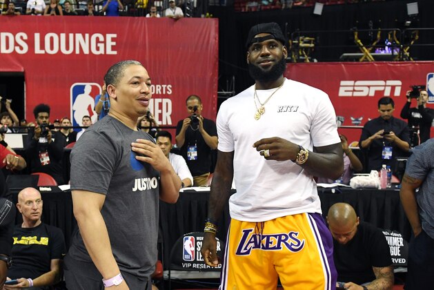 LAS VEGAS, NV - JULY 15:  Head coach Tyronn Lue (L) of the Cleveland Cavaliers talks with LeBron James of the Los Angeles Lakers after a quarterfinal game of the 2018 NBA Summer League between the Lakers and the Detroit Pistons at the Thomas & Mack Center on July 15, 2018 in Las Vegas, Nevada. NOTE TO USER: User expressly acknowledges and agrees that, by downloading and or using this photograph, User is consenting to the terms and conditions of the Getty Images License Agreement.  (Photo by Ethan Miller/Getty Images)