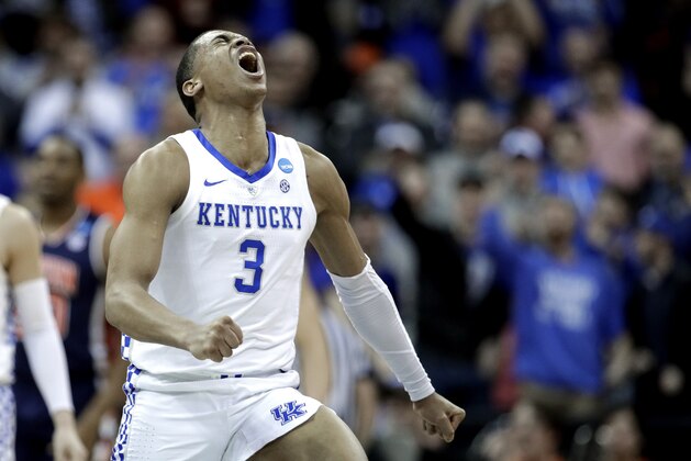 Kentucky's Keldon Johnson celebrates during the second half of the Midwest Regional final game against Auburn in the NCAA men's college basketball tournament Sunday, March 31, 2019, in Kansas City, Mo. (AP Photo/Charlie Riedel)