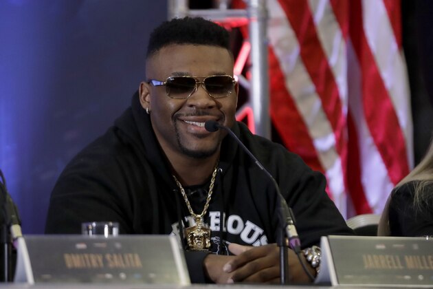 U.S. heavyweight boxer Jarrell Miller smiles during a press conference with British heavyweight boxer Anthony Joshua at the Hilton London Syon Park hotel in London, Monday, Feb. 25, 2019. On June 1, Joshua will box Miller for Joshua's WBA Super-IBF-WBO-IBO heavyweight titles at Madison Square Garden in New York. (AP Photo/Matt Dunham)