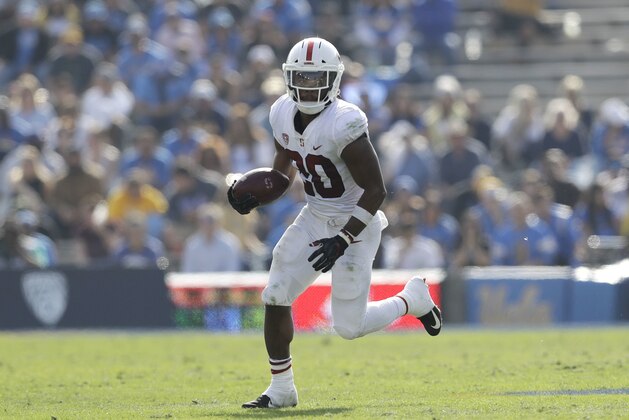 Stanford running back Bryce Love (20) runs against UCLA during the first half of an NCAA college football game Saturday, Nov. 24, 2018, in Pasadena, Calif. (AP Photo/Marcio Jose Sanchez)