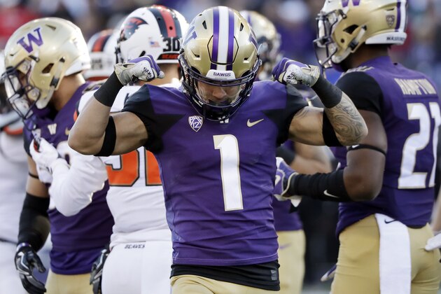 Washington's Byron Murphy reacts to a play against Oregon State in an NCAA college football game Saturday, Nov. 17, 2018, in Seattle. (AP Photo/Elaine Thompson)