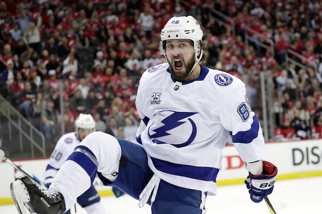 Tampa Bay Lightning right wing Nikita Kucherov, of Russia, celebrates his goal against the New Jersey Devils during the first period of Game 4 of an NHL first-round hockey playoff series, Wednesday, April 18, 2018, in Newark, N.J. (AP Photo/Julio Cortez)