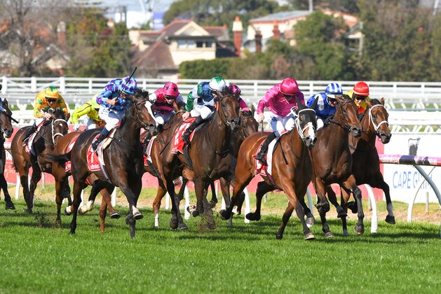MELBOURNE, AUSTRALIA - APRIL 20: Damien Oliver riding Princess Jenni (L) winning Race 4 Jack Elliott Handicap during the Easter Cup Races at Caulfield Racecourse on April 20, 2019 in Melbourne, Australia. (Photo by Vince Caligiuri/Getty Images)