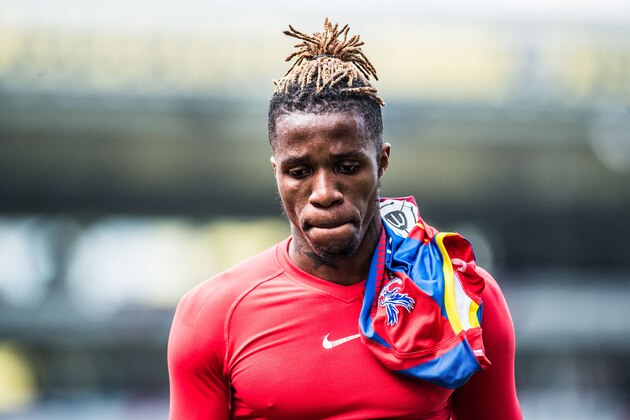 LONDON, ENGLAND - APRIL 14: Wilfried Zaha of Crystal Palace looks on during the Premier League match between Crystal Palace and Manchester City at Selhurst Park on April 14, 2019 in London, United Kingdom. (Photo by Sebastian Frej/MB Media/Getty Images)