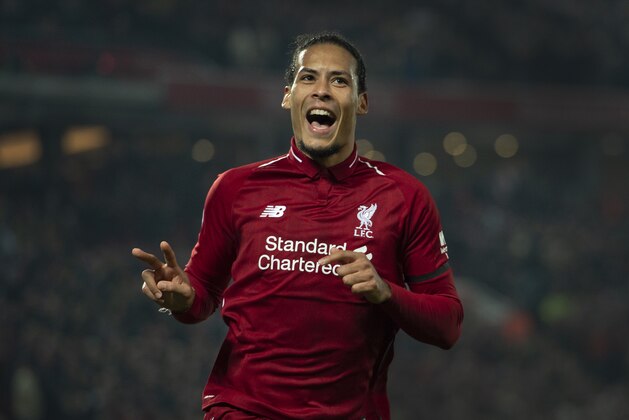 LIVERPOOL, ENGLAND - FEBRUARY 27: Virgil van Dijk of Liverpool celebrates scoring his second goal during the Premier League match between Liverpool FC and Watford FC at Anfield on February 27, 2019 in Liverpool, United Kingdom. (Photo by Visionhaus/Getty Images)