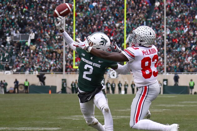 EAST LANSING, MI - NOVEMBER 10: Justin Layne #2 of the Michigan State Spartans breaks up a pass next to Terry McLaurin #83 of the Ohio State Buckeyes during the first half at Spartan Stadium on November 10, 2018 in East Lansing, Michigan. (Photo by Gregory Shamus/Getty Images)