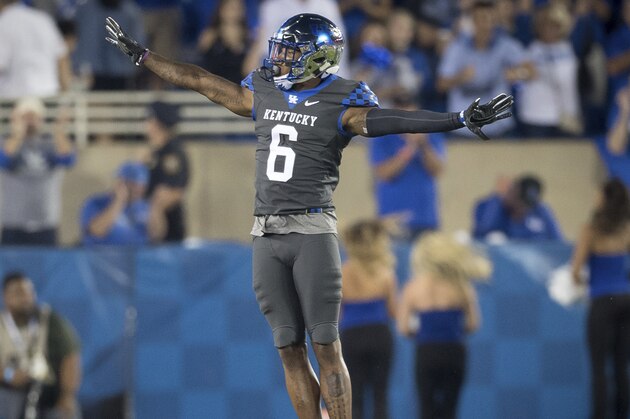 Kentucky cornerback Lonnie Johnson Jr. (6) celebrates a tackle during the second half of an NCAA college football game against South Carolina in Lexington, Ky., Saturday, Sept. 29, 2018. (AP Photo/Bryan Woolston)
