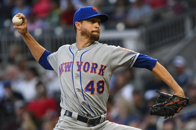New York Mets' Jacob deGrom pitches against the Atlanta Braves during the first inning of a baseball game Sunday, April 14, 2019, in Atlanta. (AP Photo/John Amis)