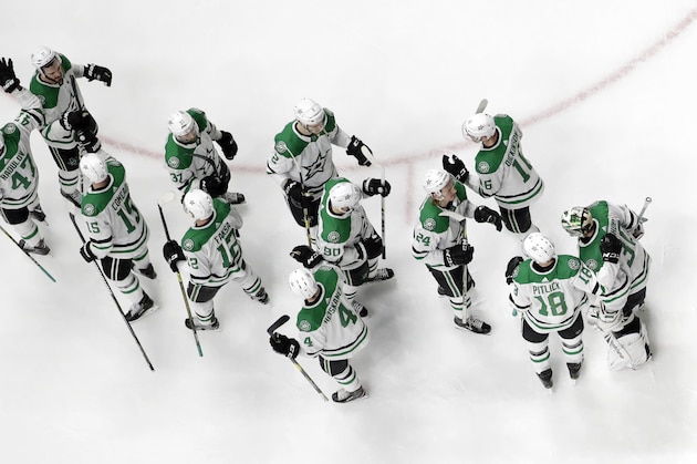 Dallas Stars players celebrate after defeating the Nashville Predators in Game 5 of an NHL hockey first-round playoff series Saturday, April 20, 2019, in Nashville, Tenn. (AP Photo/Mark Humphrey)