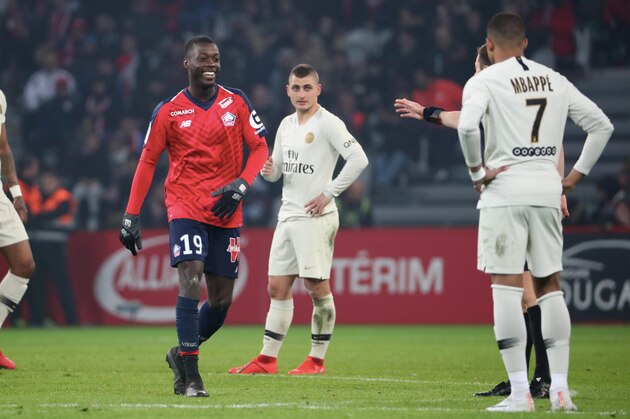 LILLE, FRANCE - APRIL 14:  Kylian Mbappe #7 of Paris Saint-Germain is disapointed after the goal of Nicolas Pepe #19  of Lille LOSC during the Ligue 1 match between Lille OSC and Paris Saint-Germain (PSG) at Stade Pierre Mauroy on April 14, 2019 in Lille, France.  (Photo by Xavier Laine/Getty Images)