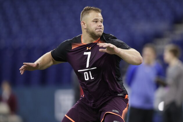 NC State offensive lineman Garrett Bradbury runs a drill at the NFL football scouting combine in Indianapolis, Friday, March 1, 2019. (AP Photo/Michael Conroy)