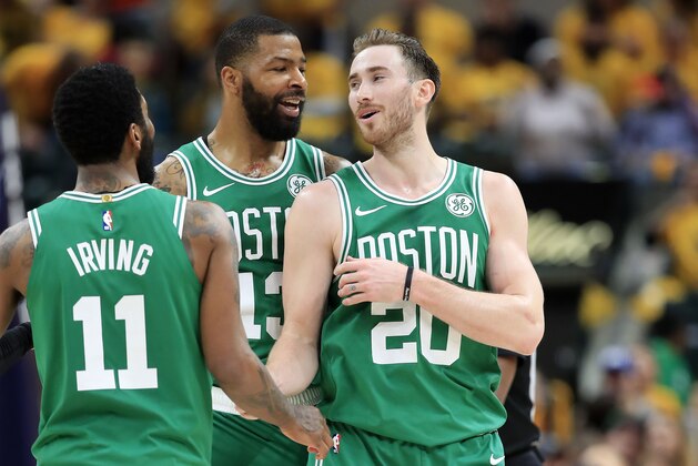 INDIANAPOLIS, INDIANA - APRIL 21:  Kyrie Irving #11 ,Marcus Morris #13 and Gordon Hayward #20 of the Boston Celtics celebrates in the 110-106 win over the Indiana Pacers in game four of the first round of the 2019 NBA Playoffs at Bankers Life Fieldhouse on April 21, 2019 in Indianapolis, Indiana.  NOTE TO USER:  User expressly acknowledges and agrees that , by downloading and or using this photograph, User is consenting to the terms and conditions of the Getty Images License Agreement. (Photo by Andy Lyons/Getty Images)