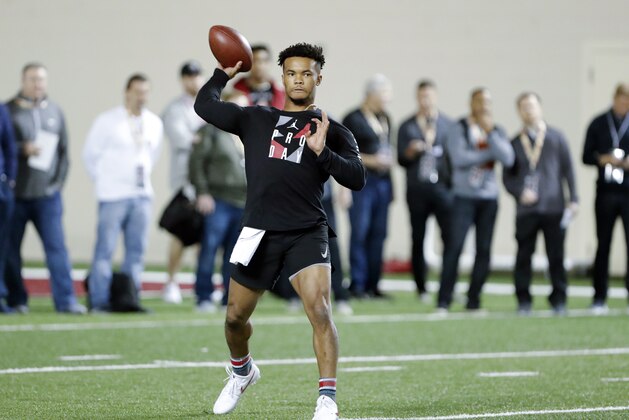 Oklahoma quarterback Kyler Murray goes through passing drills at the university's Pro Day for NFL scouts in Norman, Okla., Wednesday, March 13, 2019. (AP Photo/Alonzo Adams)