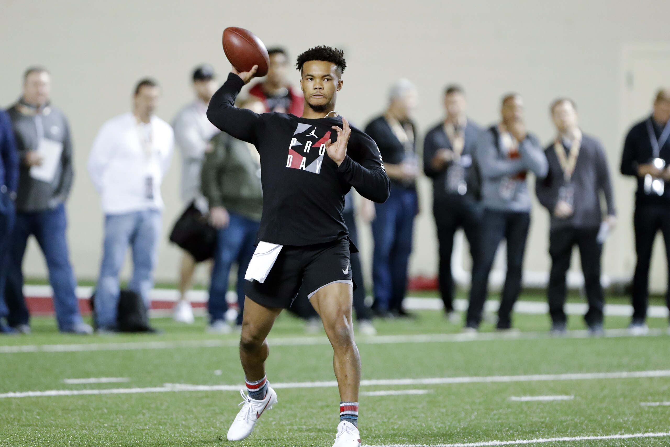 Oklahoma quarterback Kyler Murray goes through passing drills at the university's Pro Day for NFL scouts in Norman, Okla., Wednesday, March 13, 2019. (AP Photo/Alonzo Adams)