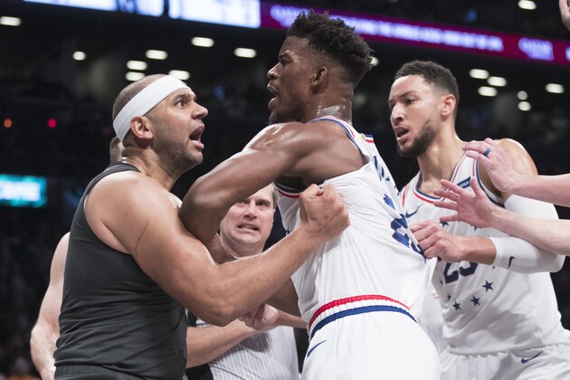 CORRECTS TO SECOND HALF NOT FIRST HALF - Brooklyn Nets forward Jared Dudley, left, and Philadelphia 76ers guard Jimmy Butler (23) get into a shoving match during the second half of Game 4 of a first-round NBA basketball playoff series, Saturday, April 20, 2019, in New York. (AP Photo/Mary Altaffer)