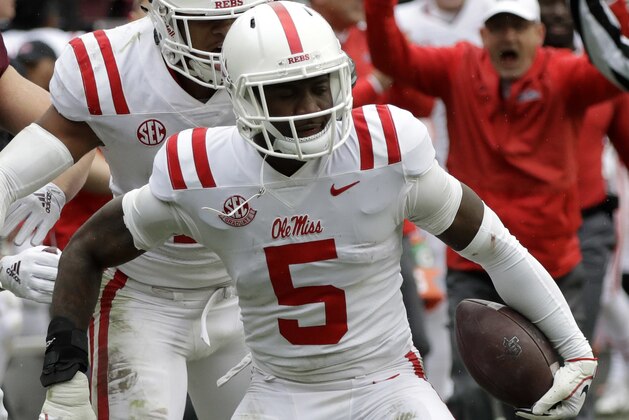 Mississippi Rebels defensive back Ken Webster (5) celebrates after intercepting a pass against Texas A&M during the second half of an NCAA college football game Saturday, Nov. 10, 2018, in College Station, Texas. Texas A&M won 38-24. (AP Photo/David J. Phillip)