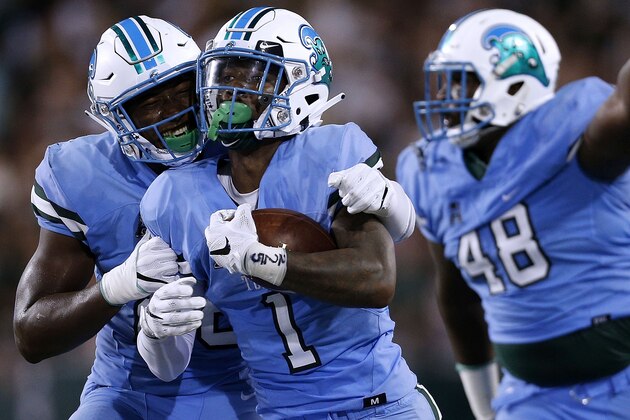 NEW ORLEANS, LA - AUGUST 30: Donnie Lewis Jr. #1 of the Tulane Green Wave celebrates an interception during the first half of a game against the Wake Forest Demon Deacons on August 30, 2018 in New Orleans, Louisiana.  (Photo by Jonathan Bachman/Getty Images)