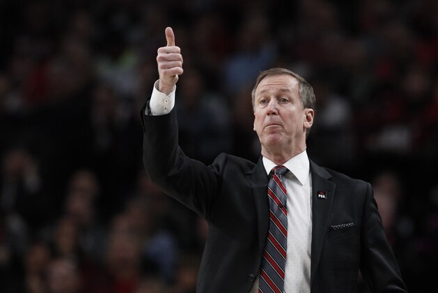 Portland Trail Blazers head coach Terry Stotts signals from the sideline during the second half of Game 1 of a first-round NBA basketball playoff series against the Oklahoma City Thunder in Portland, Ore., Sunday, April 14, 2019. (AP Photo/Steve Dipaola)