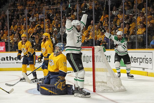 NASHVILLE, TENNESSEE - APRIL 20: Alexander Radulov #47 of the Dallas Stars celebrates with teammate Jamie Benn #14 after scoring a goal against goalie Pekka Rinne #35 of the Nashville Predators during the second period  of Game Five of the Western Conference First Round during the 2019 NHL Stanley Cup Playoffs at Bridgestone Arena on April 20, 2019 in Nashville, Tennessee. (Photo by Frederick Breedon/Getty Images)