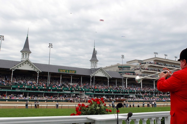 LOUISVILLE, KY - MAY 7: Churchill Downs bugler Steve Buttleman plays call to post in front of a packed Twin Spires grandstand ,on May 7, 2016 at Churchill Downs in Louisville, Kentucky.  (Photo by Horsephotos/Getty Images)
