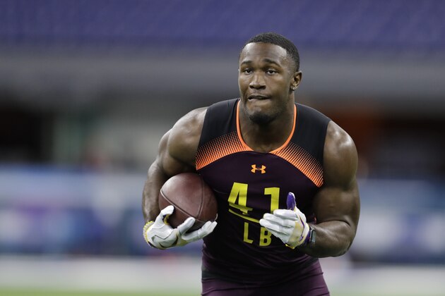 LSU linebacker Devin White runs a drill during the NFL football scouting combine, Sunday, March 3, 2019, in Indianapolis. (AP Photo/Darron Cummings)