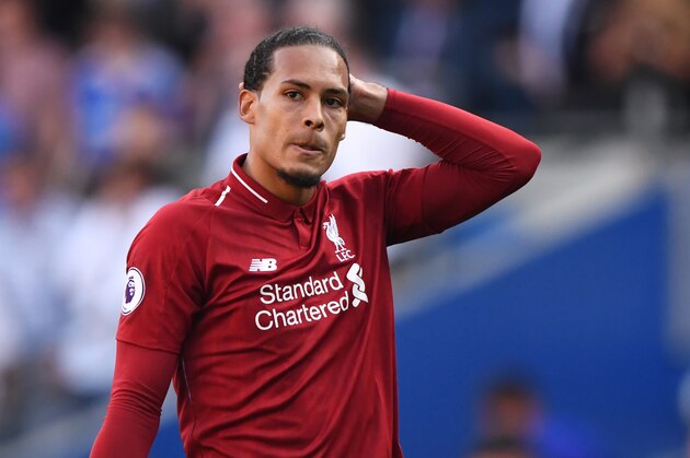 CARDIFF, WALES - APRIL 21: Liverpool defender Virgil van Dijk looks on  during the Premier League match between Cardiff City and Liverpool FC at Cardiff City Stadium on April 21, 2019 in Cardiff, United Kingdom. (Photo by Stu Forster/Getty Images)