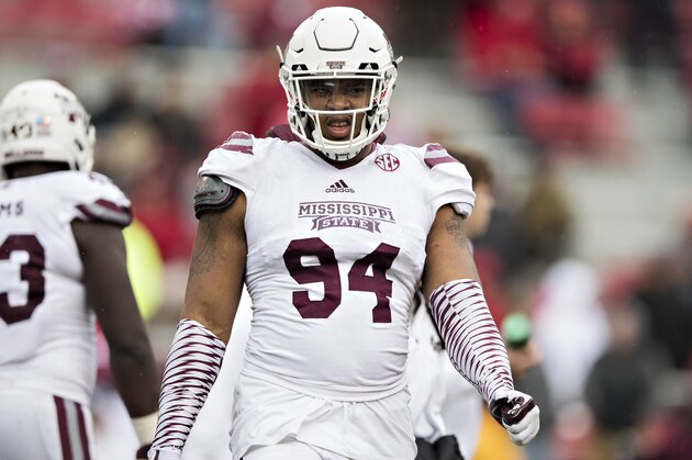FAYETTEVILLE, AR - NOVEMBER 18:  Jeffery Simmons #94 of the Mississippi State Bulldogs walks off the field during a game againstf the Arkansas Razorbacks at Razorback Stadium on November 18, 2017 in Fayetteville, Arkansas.  The Bulldogs defeated the Razorbacks 28-21.  (Photo by Wesley Hitt/Getty Images)