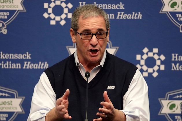 FILE - In this April 19, 2018, file photo, New York Giants Dave Gettleman speaks to reporters during a press conference in East Rutherford, N.J. If the new general manager is convinced there is a guy who can lead to the team to a couple of Super Bowls _ and the Cleveland Browns haven’t taken him _ the Giants grab a quarterback.  It’s that simple when you are coming off a 3-13 season and Eli Manning is 37 years old. (AP Photo/Julio Cortez, File)