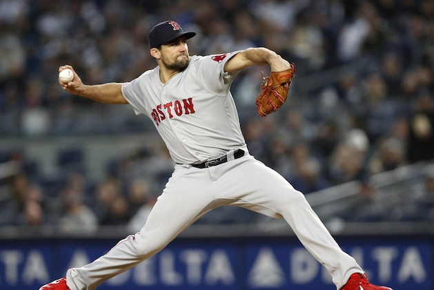Boston Red Sox starting pitcher Nathan Eovaldi winds up during the fourth inning of a  baseball game against the New York Yankees, Wednesday, April 17, 2019, in New York. (AP Photo/Kathy Willens)