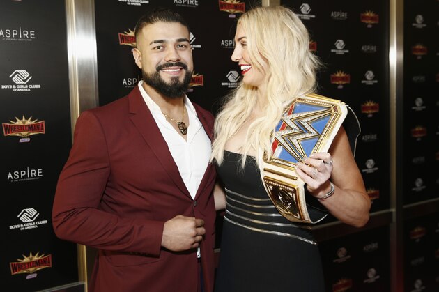 NEW YORK, NEW YORK - APRIL 05: WWE Superstars Andrade and Charlotte Flair attend the WWE Superstars For Hope Reception on April 05, 2019 in New York City. (Photo by Brian Ach/Getty Images for WWE)