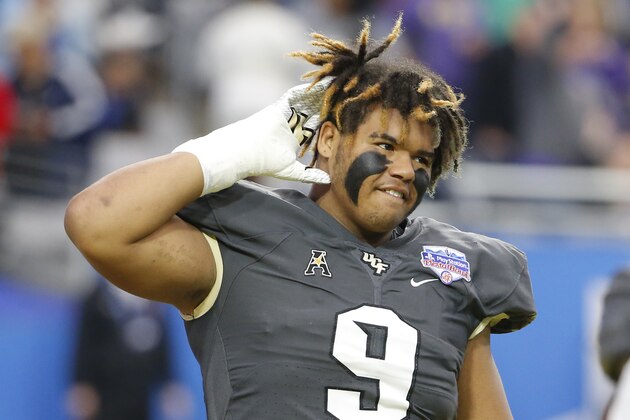 UCF defensive lineman Trysten Hill (9) during the Fiesta Bowl NCAA college football game against LSU, Tuesday, Jan. 1, 2019, in Glendale, AZ. (AP Photo/Rick Scuteri)