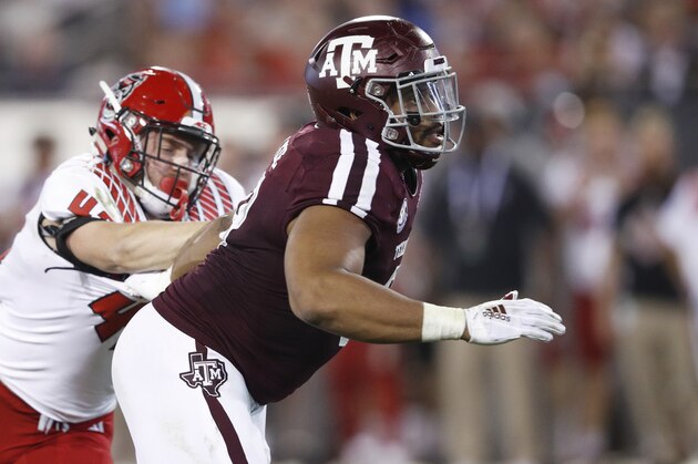 JACKSONVILLE, FL - DECEMBER 31: Kingsley Keke #8 of the Texas A&M Aggies in action against the North Carolina State Wolfpack during the TaxSlayer Gator Bowl at TIAA Bank Field on December 31, 2018 in Jacksonville, Florida. Texas A&M won 52-13. (Photo by Joe Robbins/Getty Images)