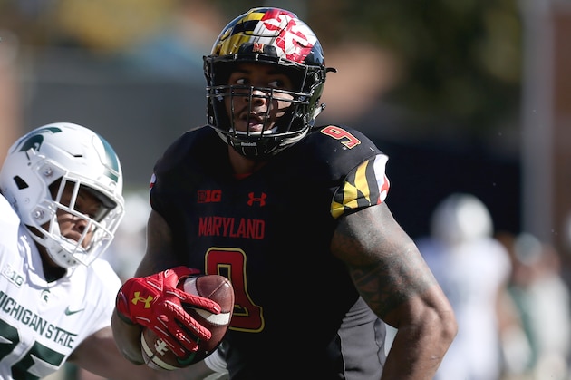COLLEGE PARK, MD - NOVEMBER 03: Darrell Stewart Jr. #25 of the Michigan State Spartans forces a fumble on Byron Cowart #9 of the Maryland Terrapins during the second half at Capital One Field on November 3, 2018 in College Park, Maryland. (Photo by Will Newton/Getty Images)