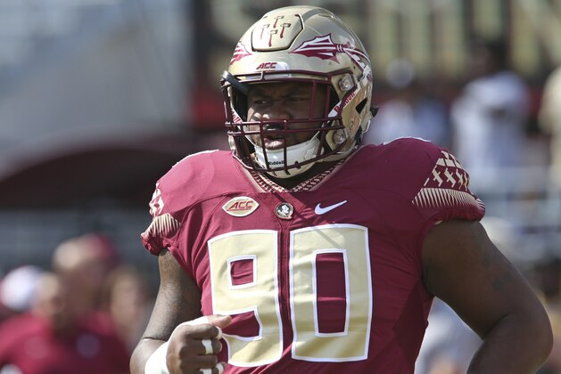 Florida State's Demarcus Christmas warms up before the start of an NCAA college football game with Wake Forest, Saturday, Oct. 20, 2018 in Tallahassee, Fla. Florida State won 38-17. (AP Photo/Steve Cannon)