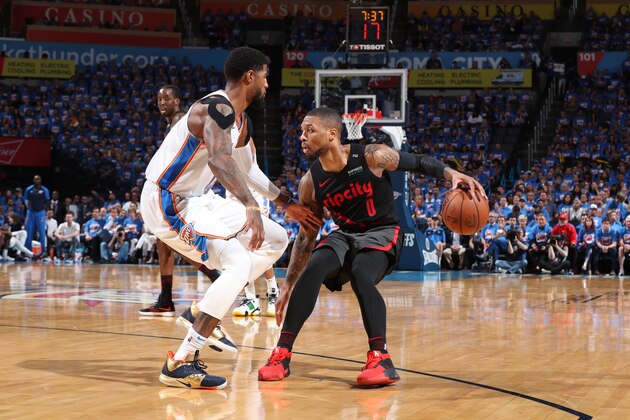 OKLAHOMA CITY, OK - APRIL 21: Damian Lillard #0 of the Portland Trail Blazers handles the ball against the Oklahoma City Thunder during Game Four of Round One of the 2019 NBA Playoffs on April 21, 2019 at Chesapeake Energy Arena in Oklahoma City, Oklahoma. NOTE TO USER: User expressly acknowledges and agrees that, by downloading and/or using this photograph, user is consenting to the terms and conditions of the Getty Images License Agreement. Mandatory Copyright Notice: Copyright 2019 NBAE (Photo by Joe Murphy/NBAE via Getty Images)