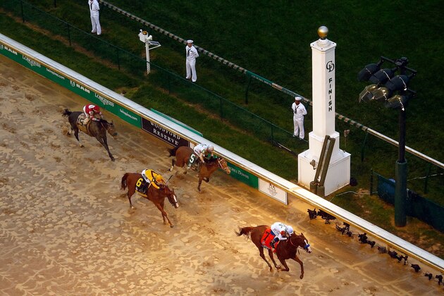 LOUISVILLE, KY - MAY 05:  Justify #7, ridden by jockey Mike Smith, crosses the finish line to win the 144th running of the Kentucky Derby at Churchill Downs on May 5, 2018 in Louisville, Kentucky.  (Photo by Jamie Squire/Getty Images)