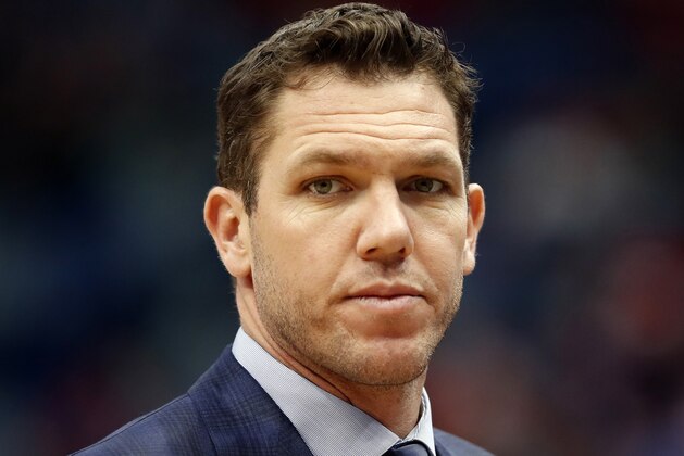 FILE - In this March 31, 2019, file photo, Los Angeles Lakers head coach Luke Walton looks on during the first half of an NBA basketball game in New Orleans. The Sacramento Kings have hired Luke Walton as their coach just days after he parted ways with the Los Angeles Lakers following three losing seasons. The Kings announced Monday, April 15, 2019, that Walton will replace Dave Joerger. (AP Photo/Tyler Kaufman, File)