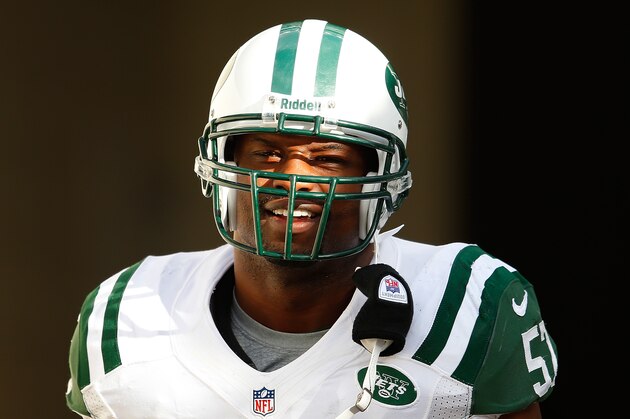 FOXBORO, MA - OCTOBER 21: Aaron Maybin #51 of the New York Jets enters the field before a game with the New England Patriots at Gillette Stadium on October 21, 2012 in Foxboro, Massachusetts. (Photo by Jim Rogash/Getty Images)