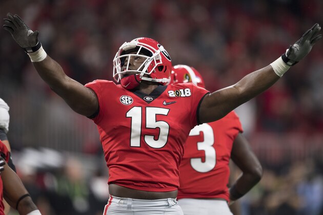 ATLANTA, GA - JANUARY 08: D'Andre Walker #15 of the Georgia Bulldogs celebrates a tackle against the Alabama Crimson Tide during the College Football Playoff National Championship held at Mercedes-Benz Stadium on January 8, 2018 in Atlanta, Georgia. Alabama defeated Georgia 26-23 for the national title. (Photo by Jamie Schwaberow/Getty Images)
