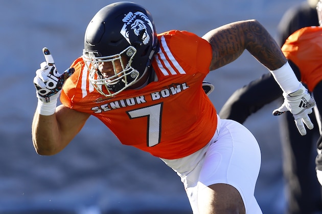 South defensive end Oshane Ximines of Old Dominion (7) runs drills during practice for Saturday's Senior Bowl college football game, Thursday, Jan. 24, 2019, in Mobile, Ala. (AP Photo/Butch Dill)